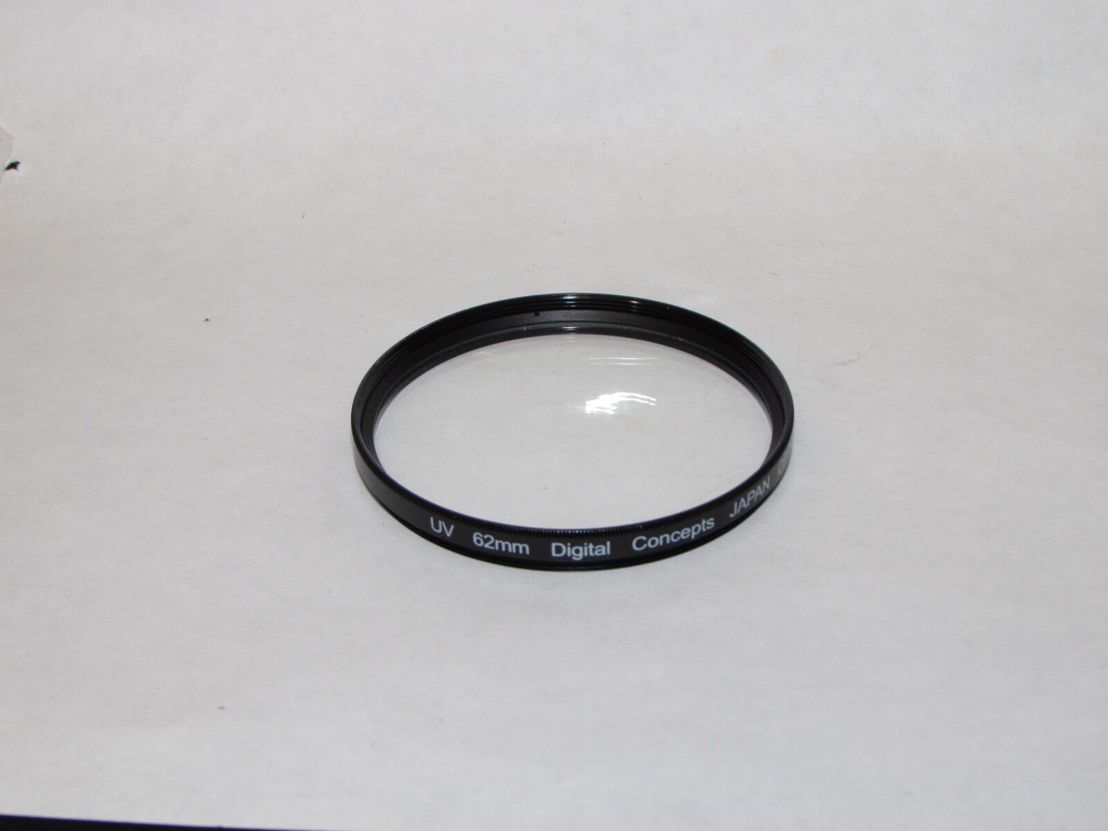 Used UV Digital Concepts 62mm Lens Filter Made in China O32234