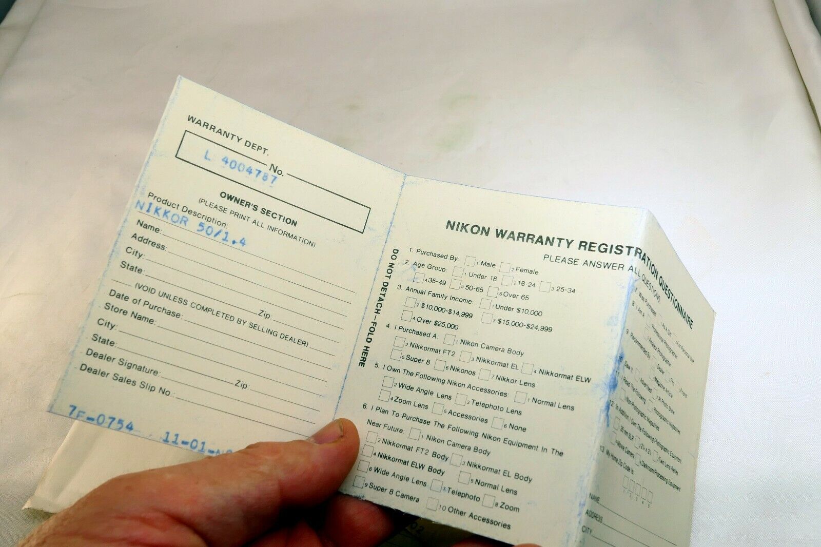 Nikon vintage warranty card (expired) for Nikkor 50mm f1.4 Non  Ai lens 1977