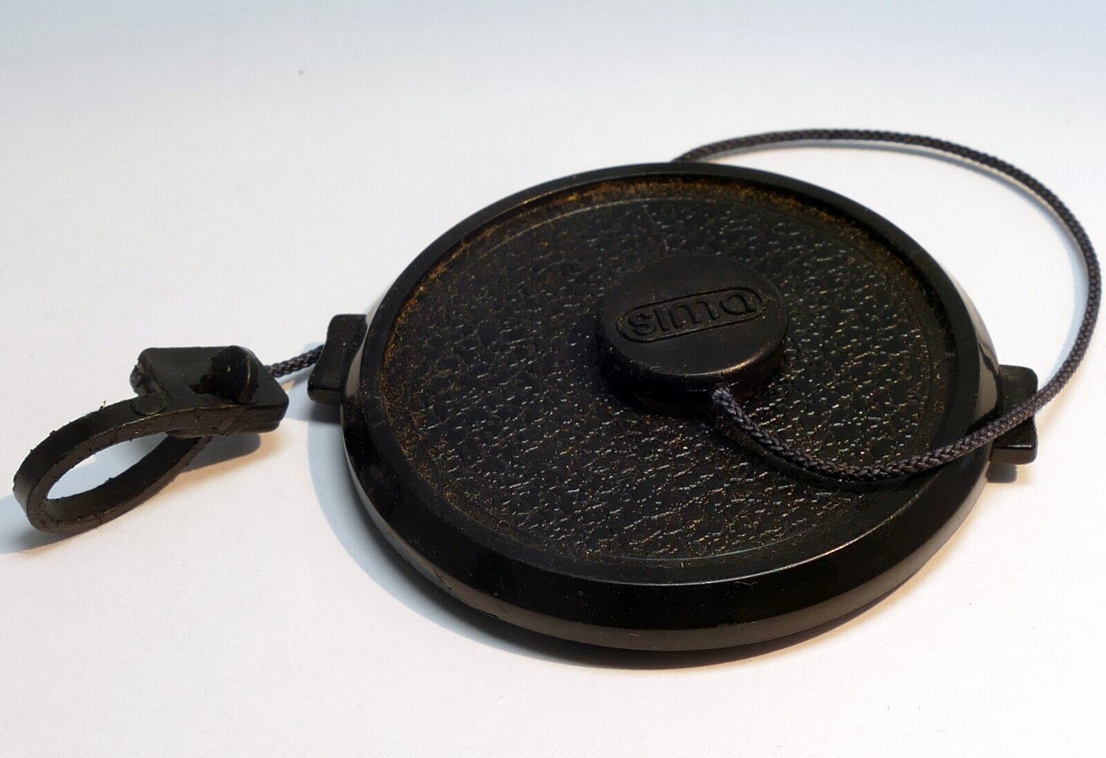 52mm snap on type Front Lens Cap with keeper string for 18-55mm zoom lens