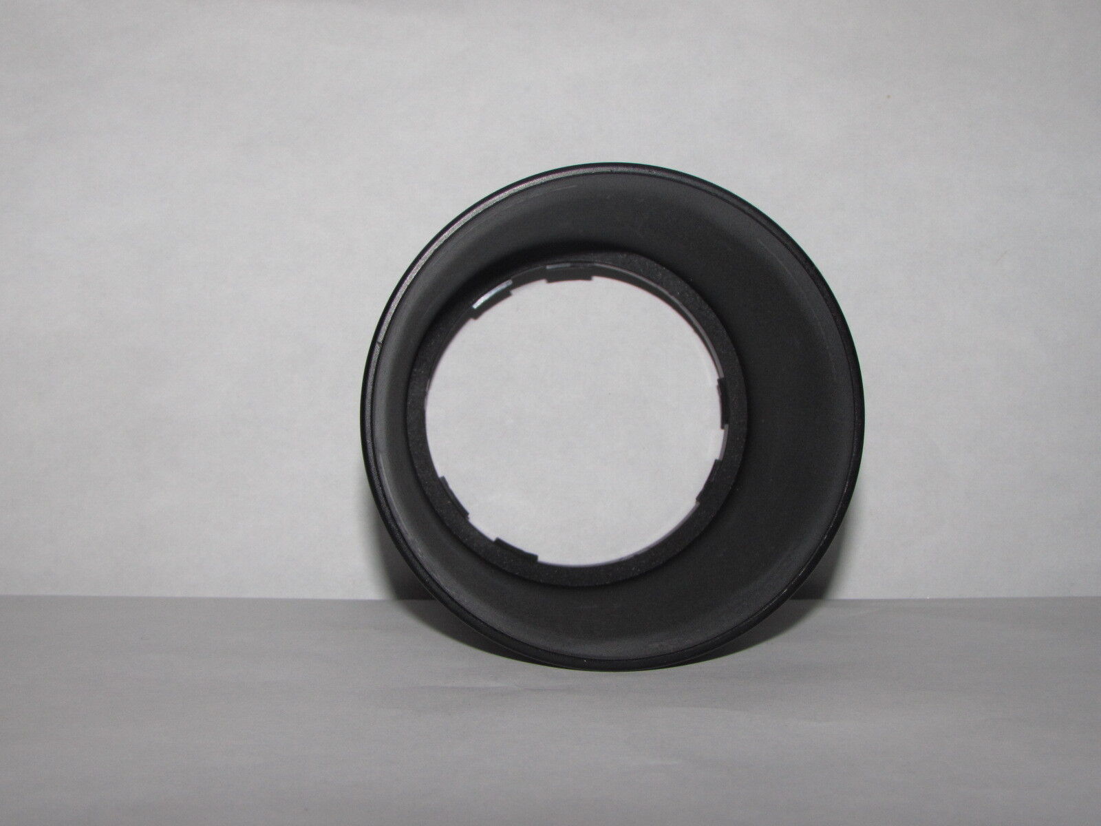 Used 60mm ID twist on type Lens Hood unknown brand plastic