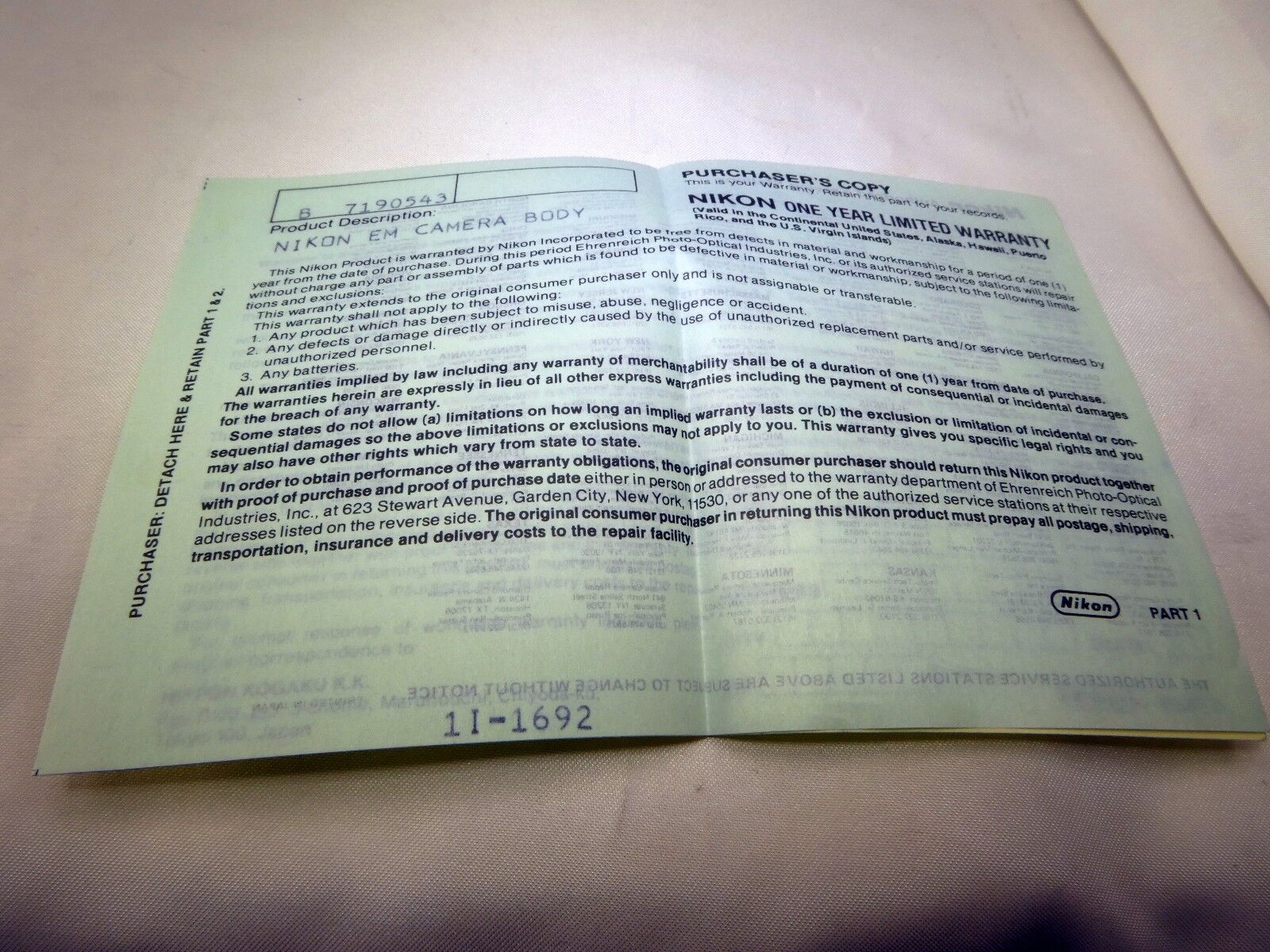 Nikon vintage warranty card (expired) for EM  camera  EN