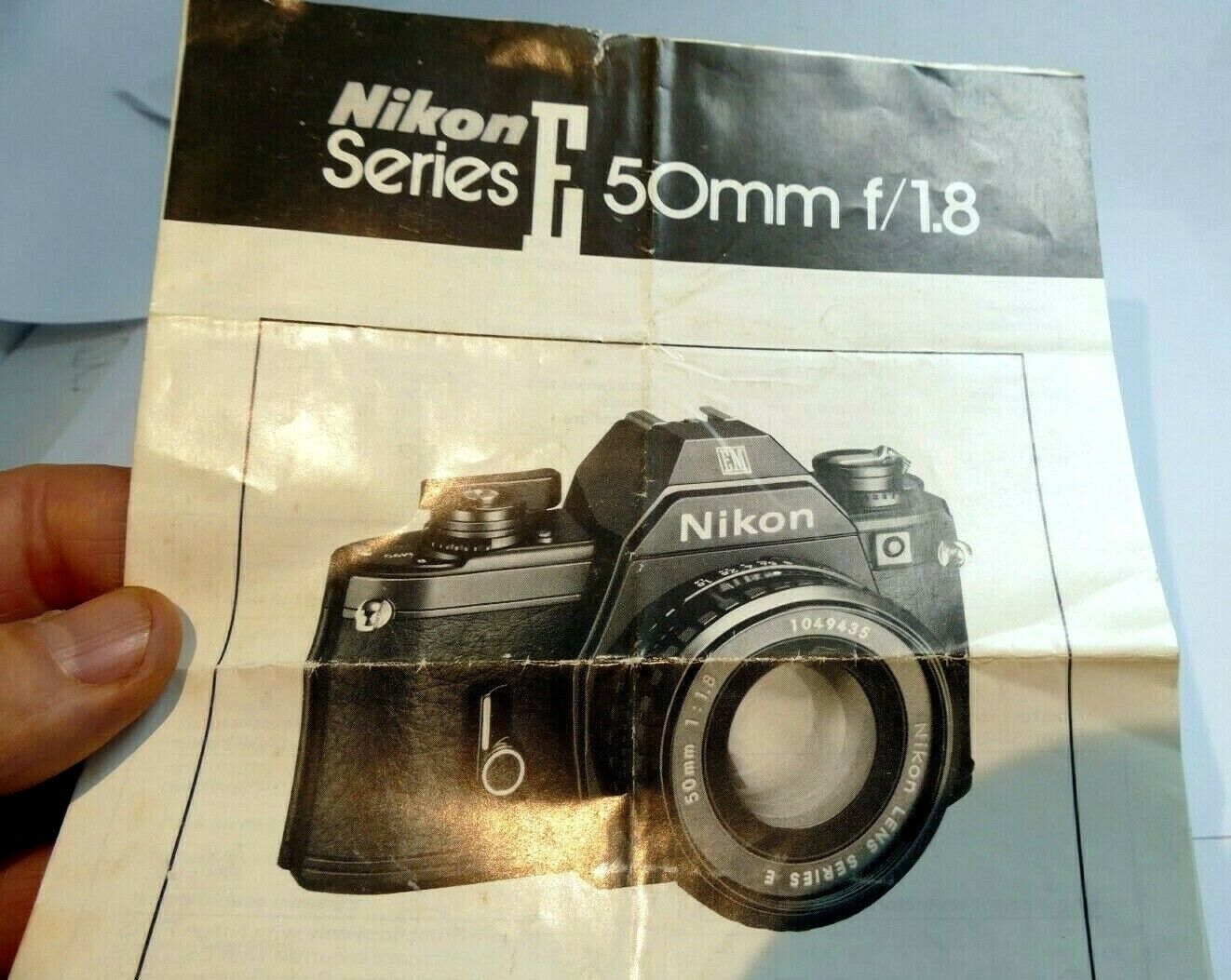 Nikon E series 50mm f1.8 Ai-s Lens instruction manual  EN English
