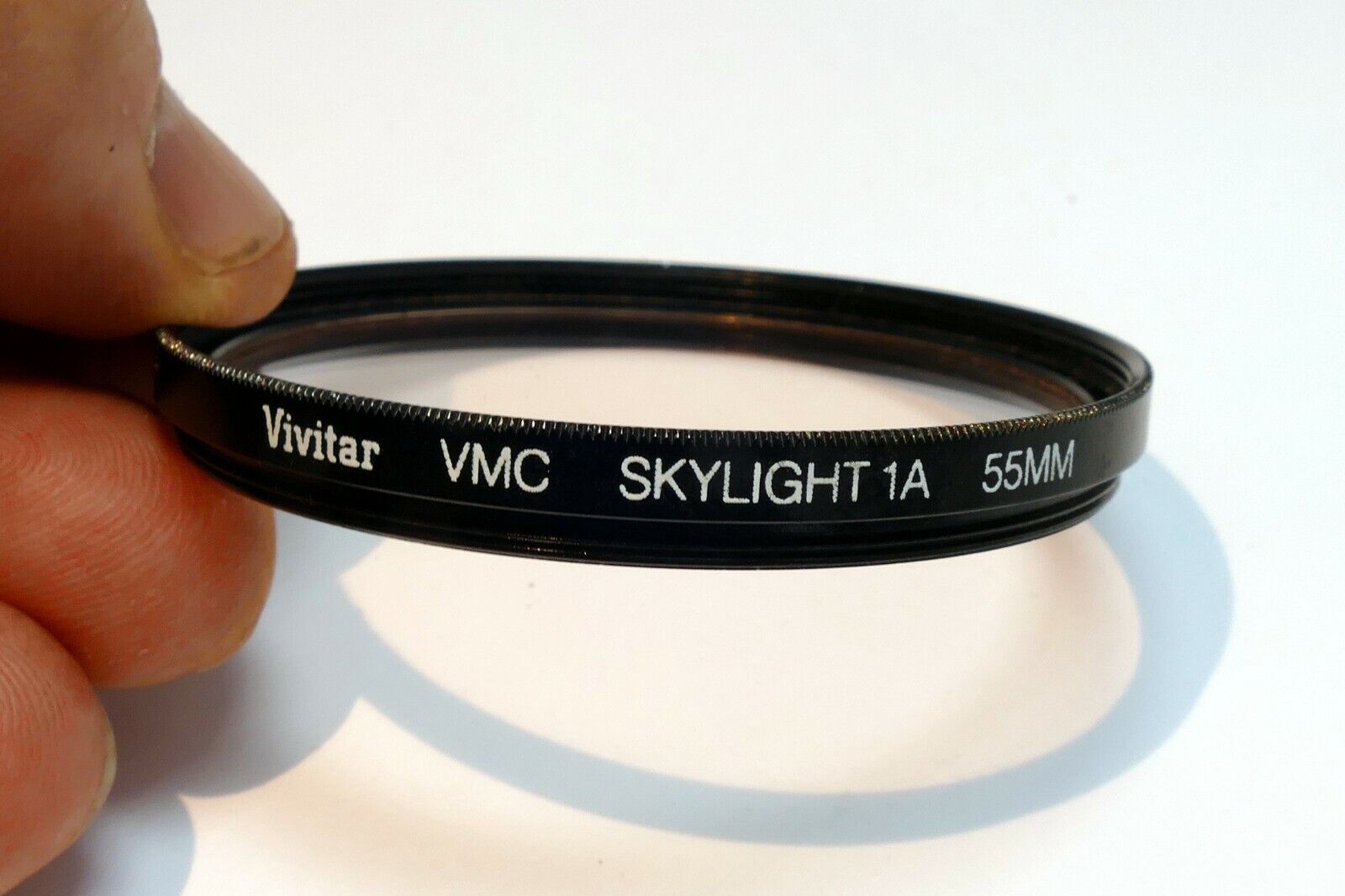 Vivitar  VMC 55mm Filter Skylight 1A sky  ( with coating scratched )