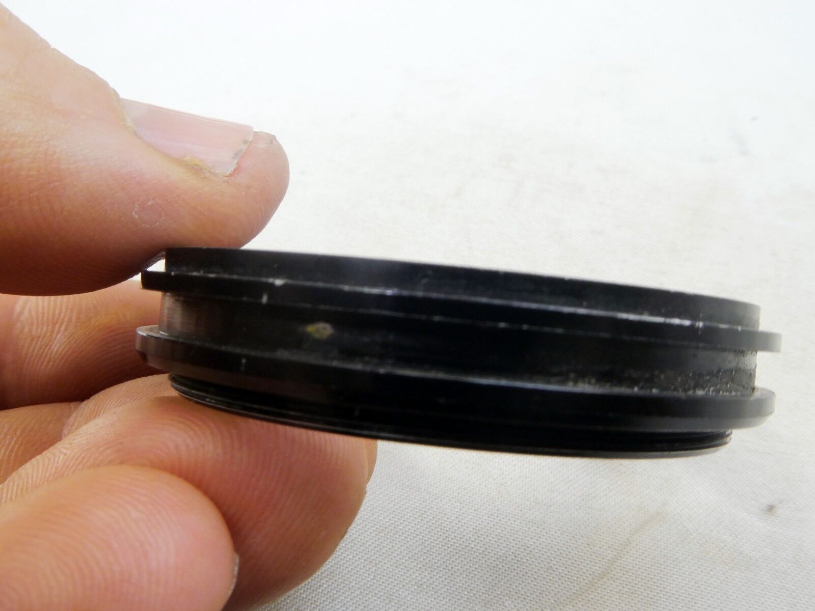 Metal ring from 49mm lens rubber hood (only metal part)