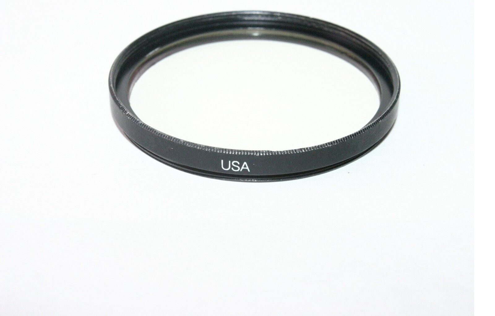 Used Vivitar VMC UV-Haze 52mm Lens Filter with smudges on the coating