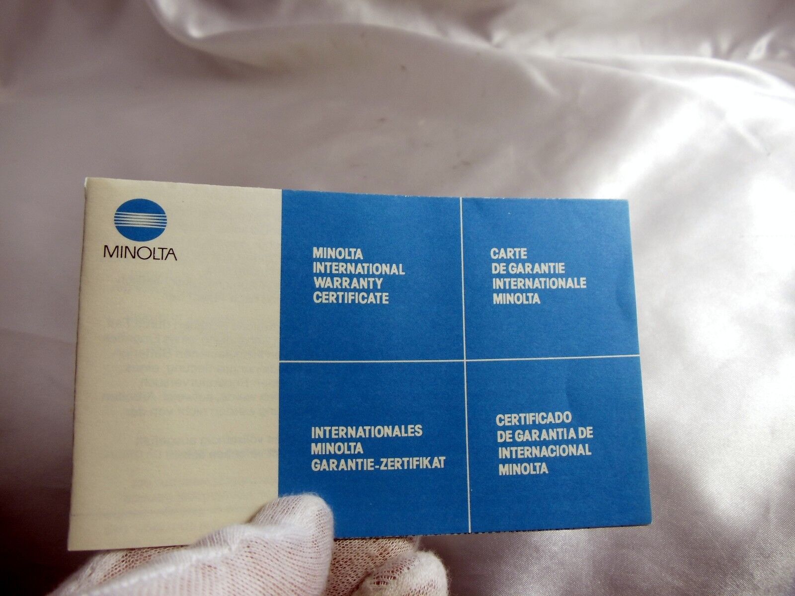 Used Minolta warranty card for Minolta 50mm f2 MD Lenses O313