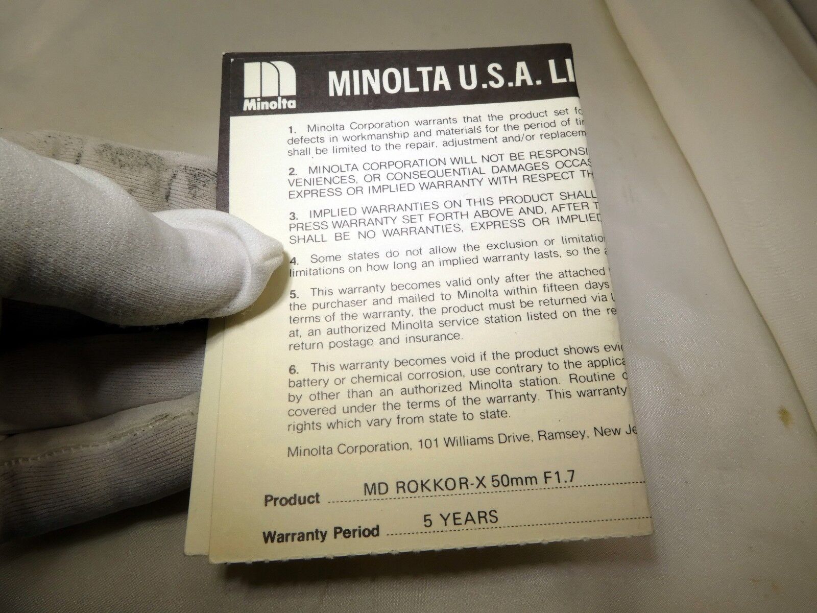 Minolta USA Limited Warranty card (EN) vintage MD Rokkor 50mm f1.7 1980