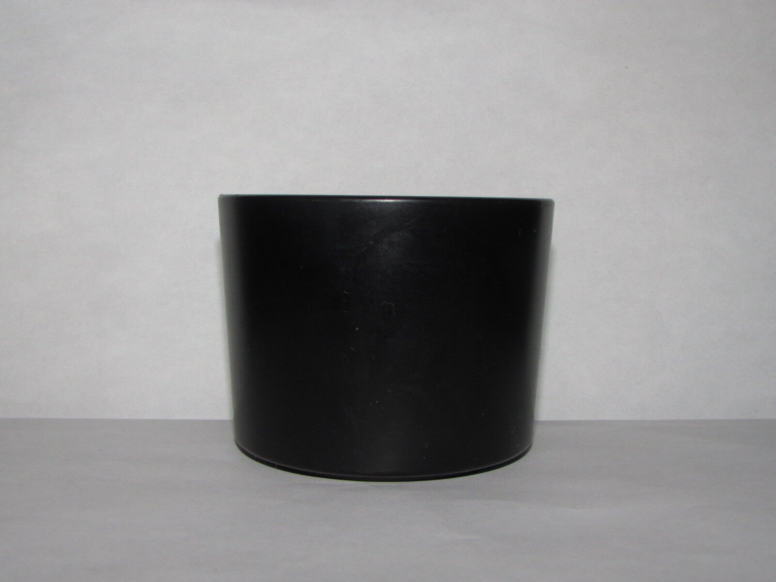 Used 60mm ID twist on type Lens Hood unknown brand plastic