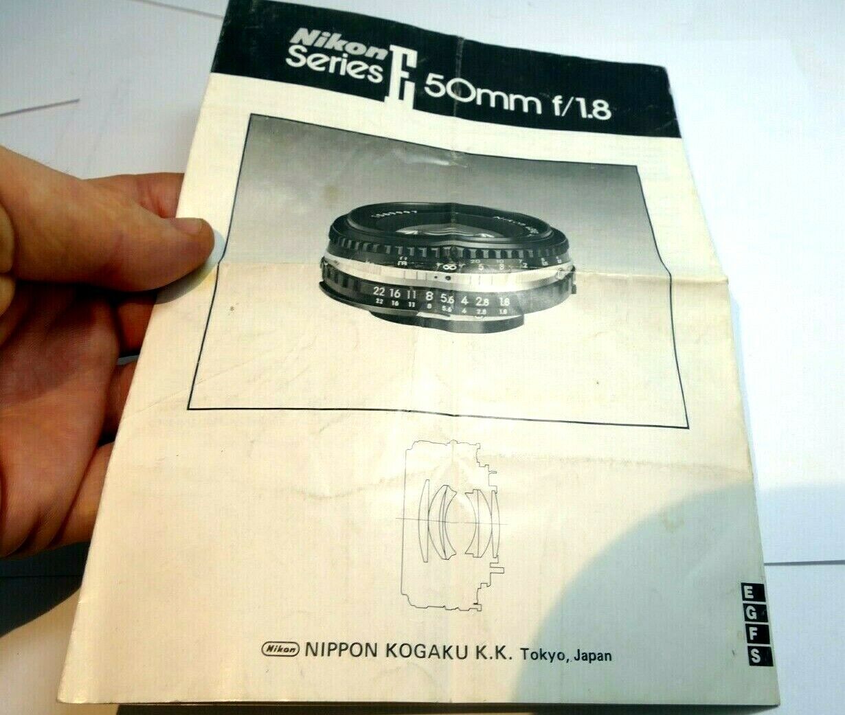 Nikon E series 50mm f1.8 Ai-s Lens instruction manual  EN German French Spanish