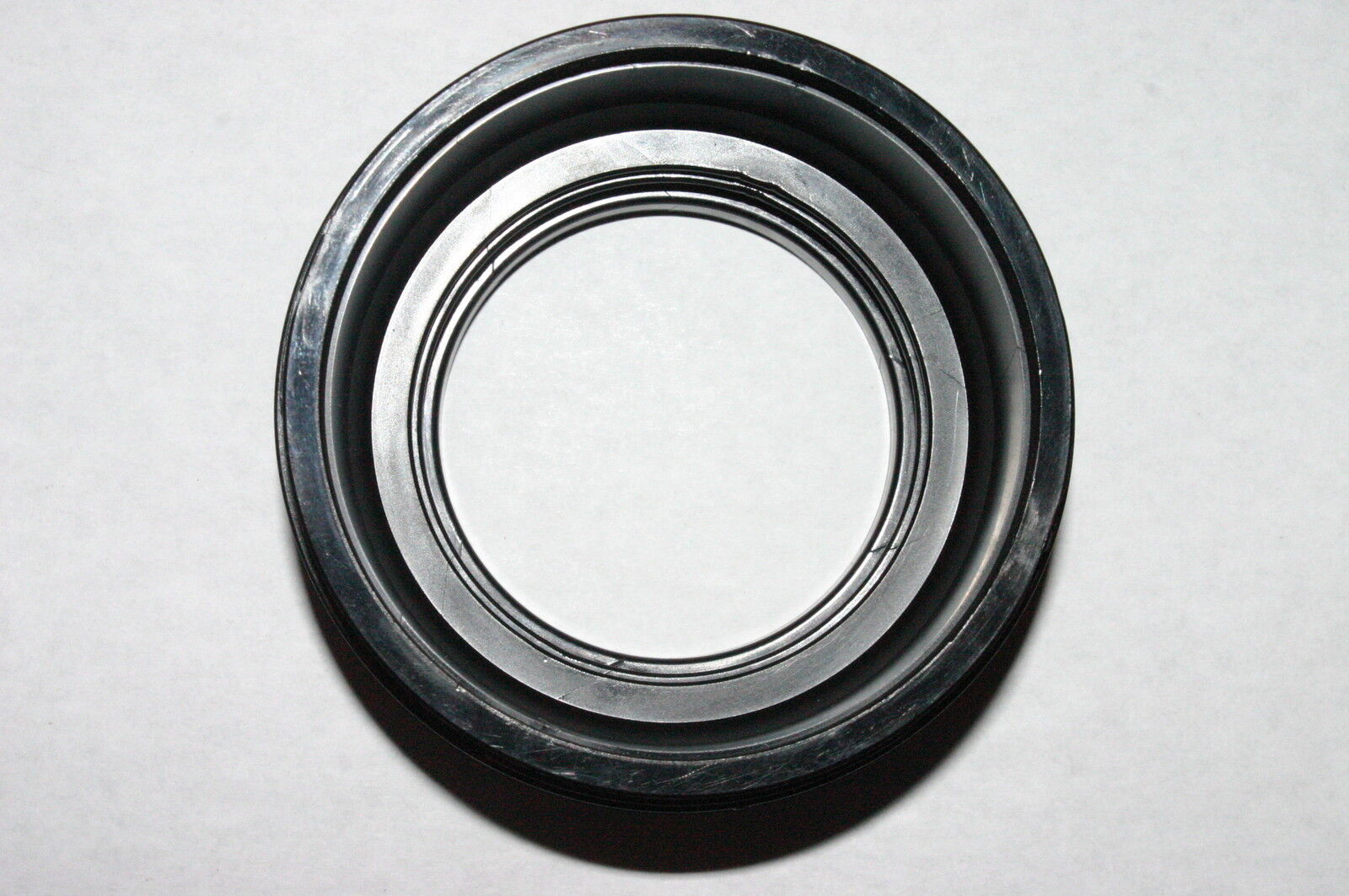 Used 56.1 screw in type Plastic Lens Hood 6412060