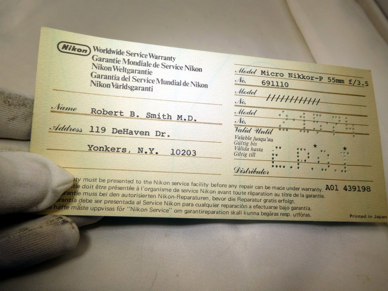 Nikon Worldwide Service Warranty card (EN) vintage micro Nikkor-P 55mm f3.5 1974