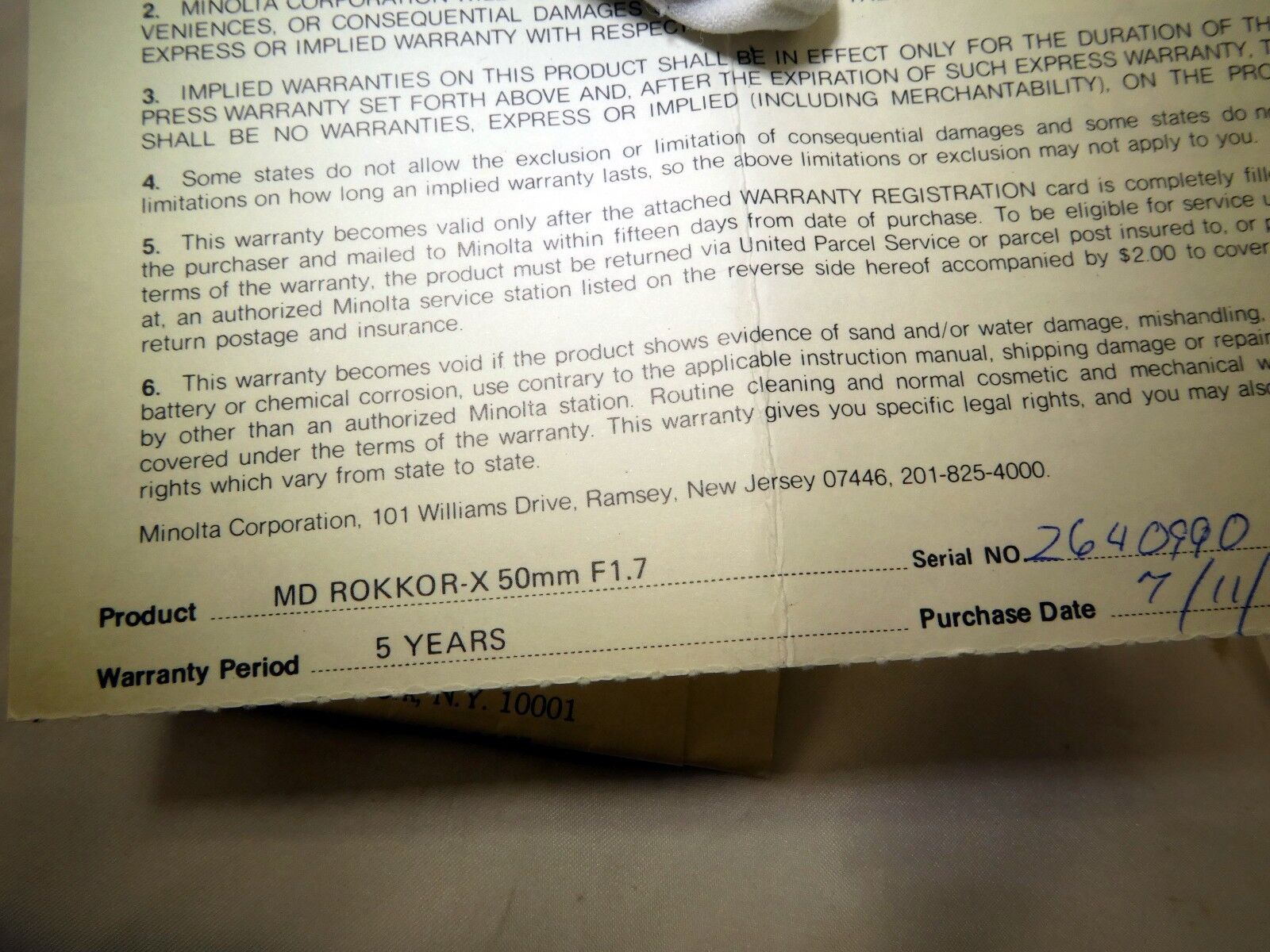 Minolta USA Limited Warranty card (EN) vintage MD Rokkor 50mm f1.7 1980