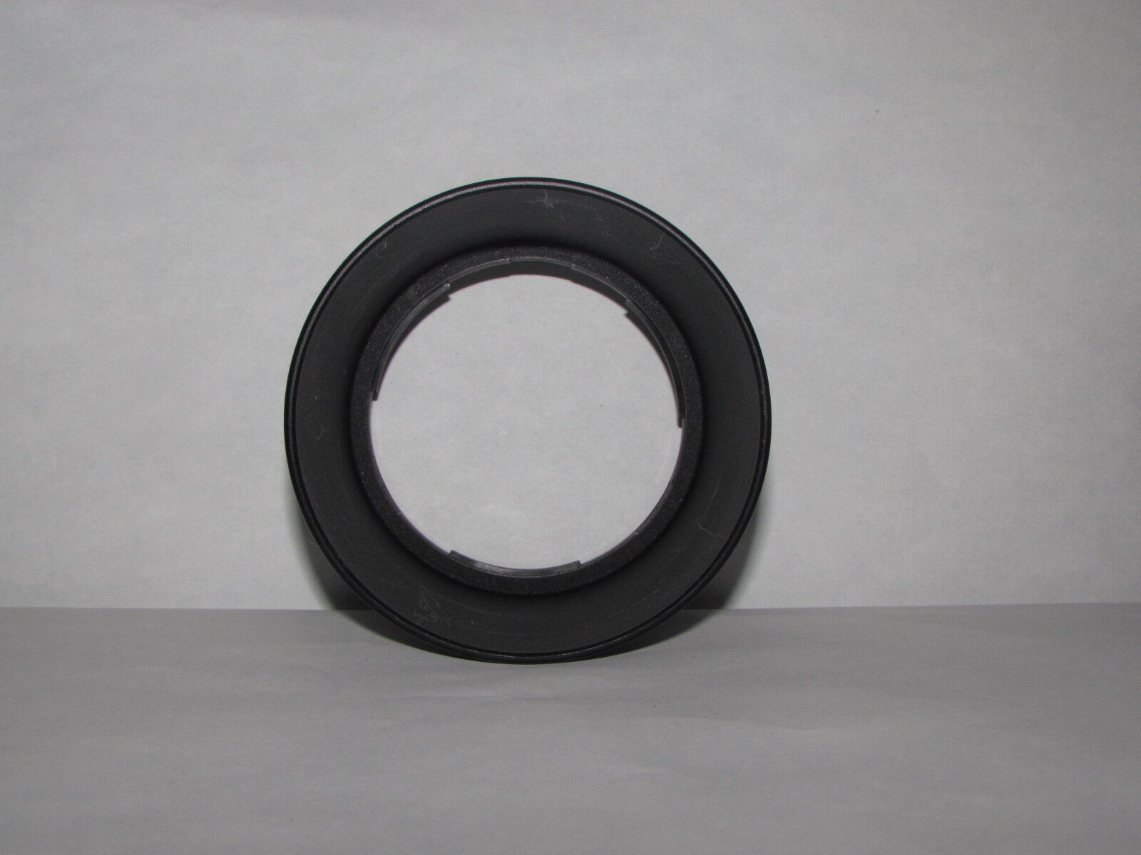 Twist on type Plastic Lens Hood unknown brand 61.7mm ID