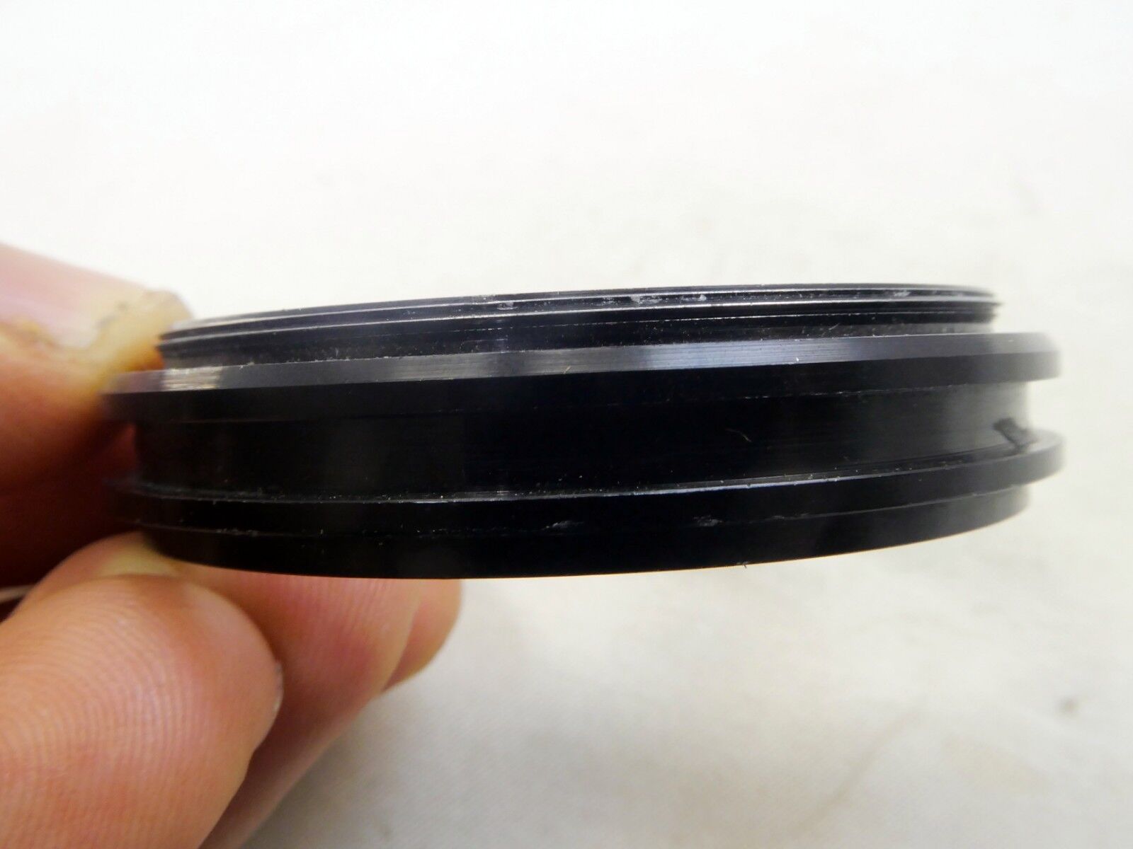 Metal ring from 49mm lens rubber hood (only metal part)