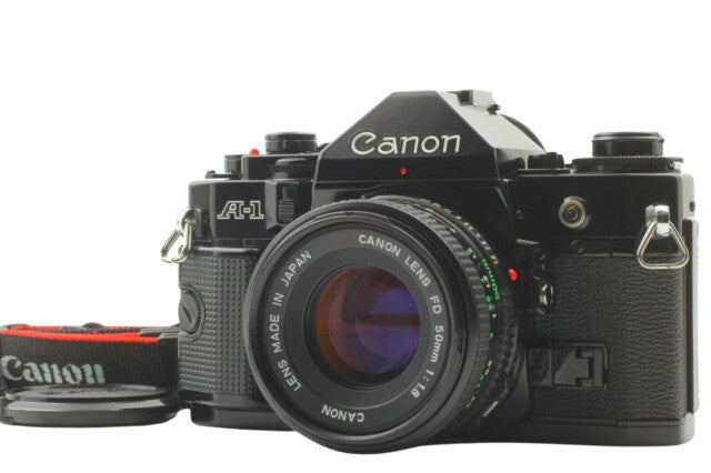 Canon A-1 35mm SLR Film Camera w/ new FD 28mm F2.8 Wide Lens outfit kit