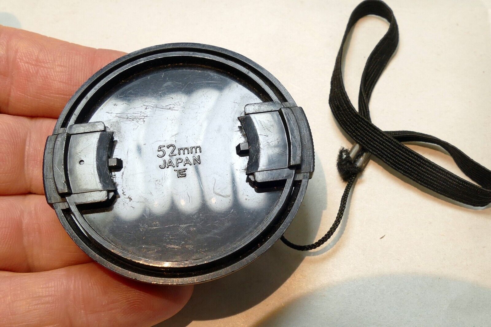 Toyo Optics 52mm lens front cap (snap on type) with keeper string