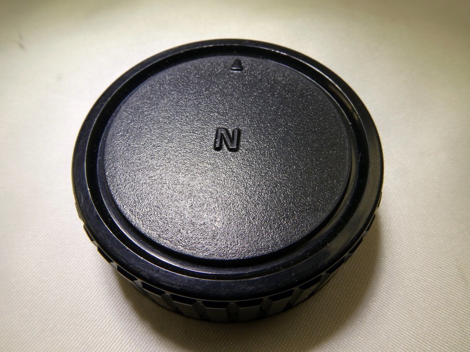 Used "N" Rear Lens Cap for Nikon F lenses 18-55mm  
