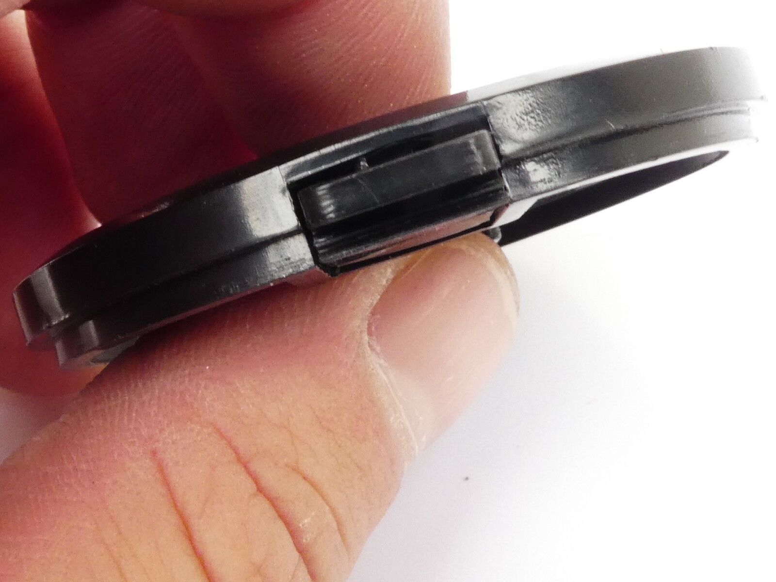 Used 49mm Lens Front Cap Black snap-on type made in Hong Kong plastic