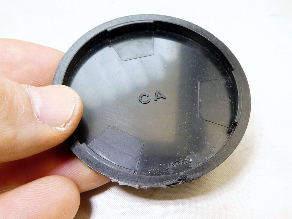 CA rear lens cap twist on type