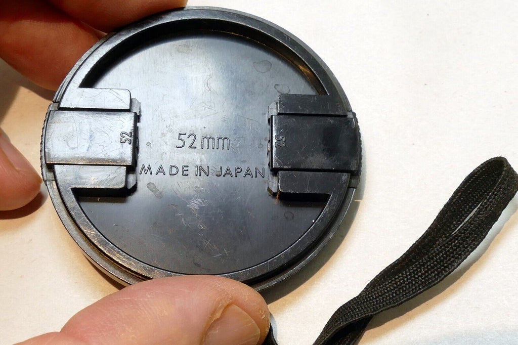 Sigma 52mm lens front cap (snap on type) with keeper string