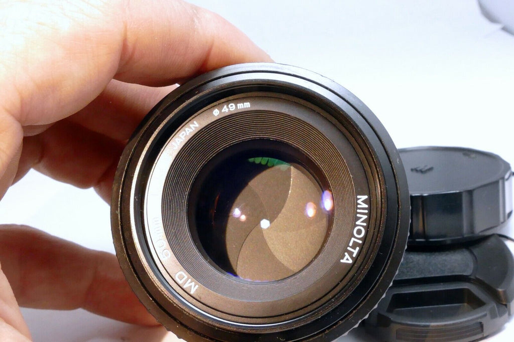 Minolta 50mm f1.7 MD manual focus with couple spots of fungus webbing works good