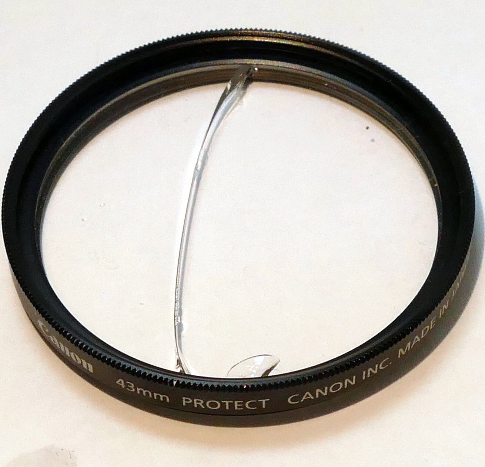 Canon 43mmm Filter clear protection - DAMAGED, Cracked glass ring good
