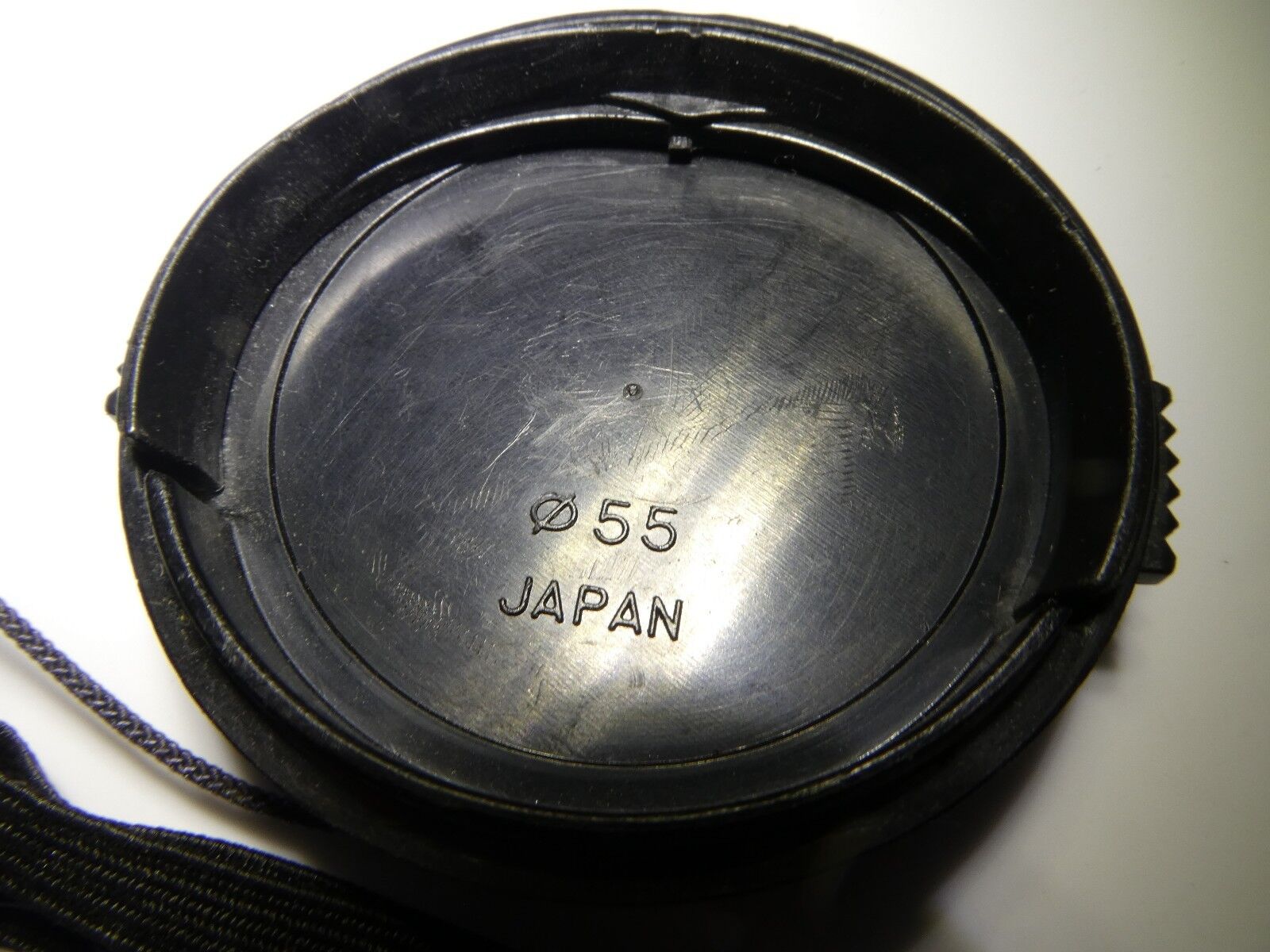 Tokina 55mm RMC II Lens Front Cap with keeper string