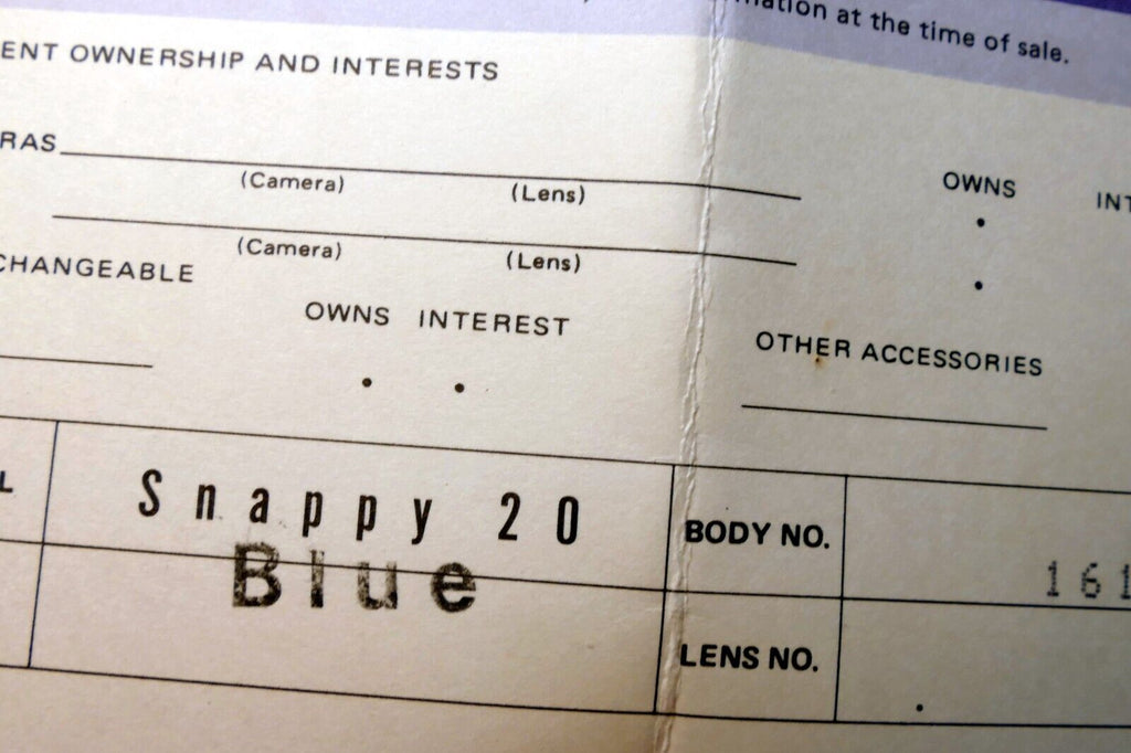 Canon Snappy-20 camera Blue warranty card vintage 1980's