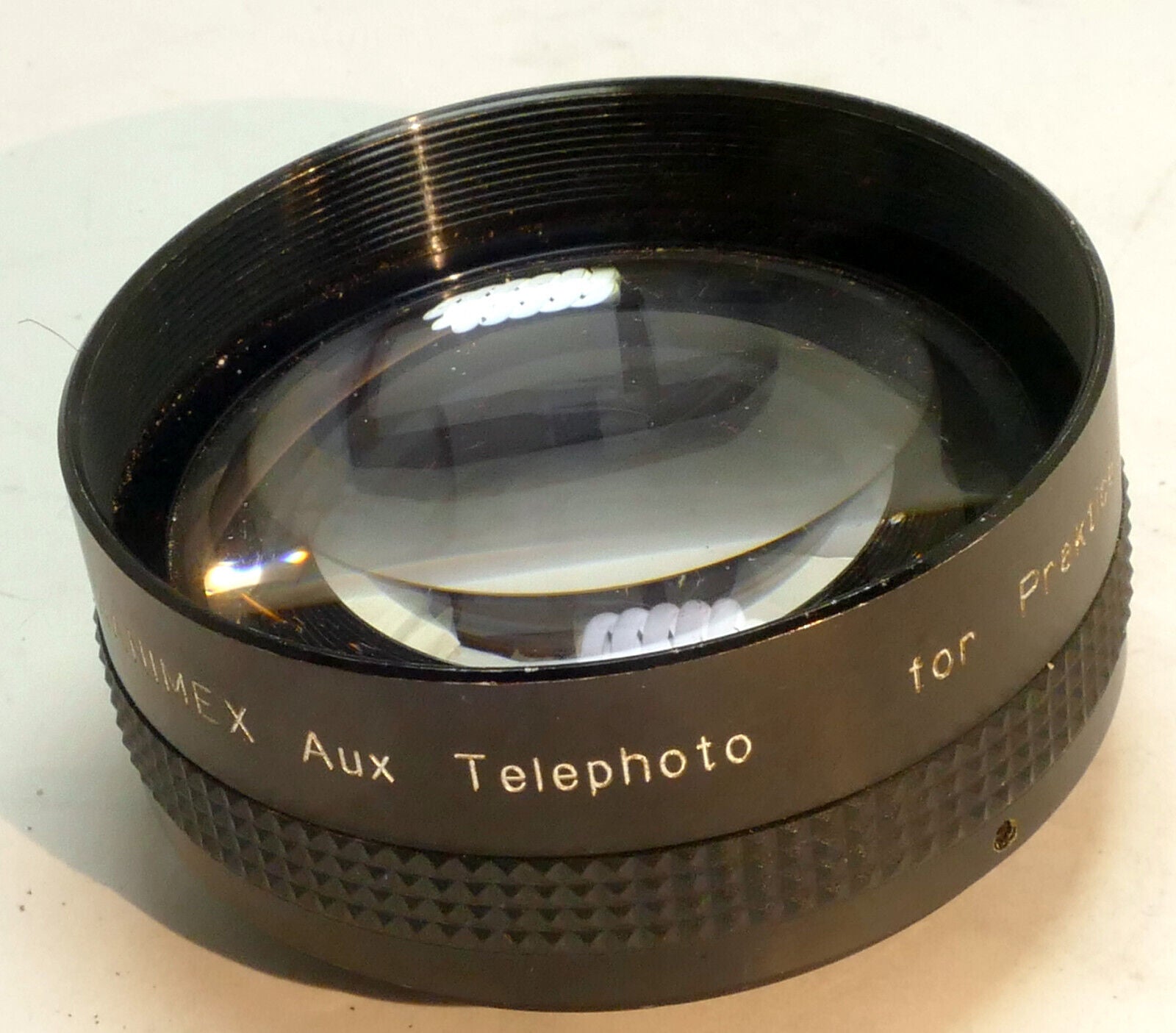 Hanimex AUX Telephoto 49mm Lens for Praktica (with some haze)