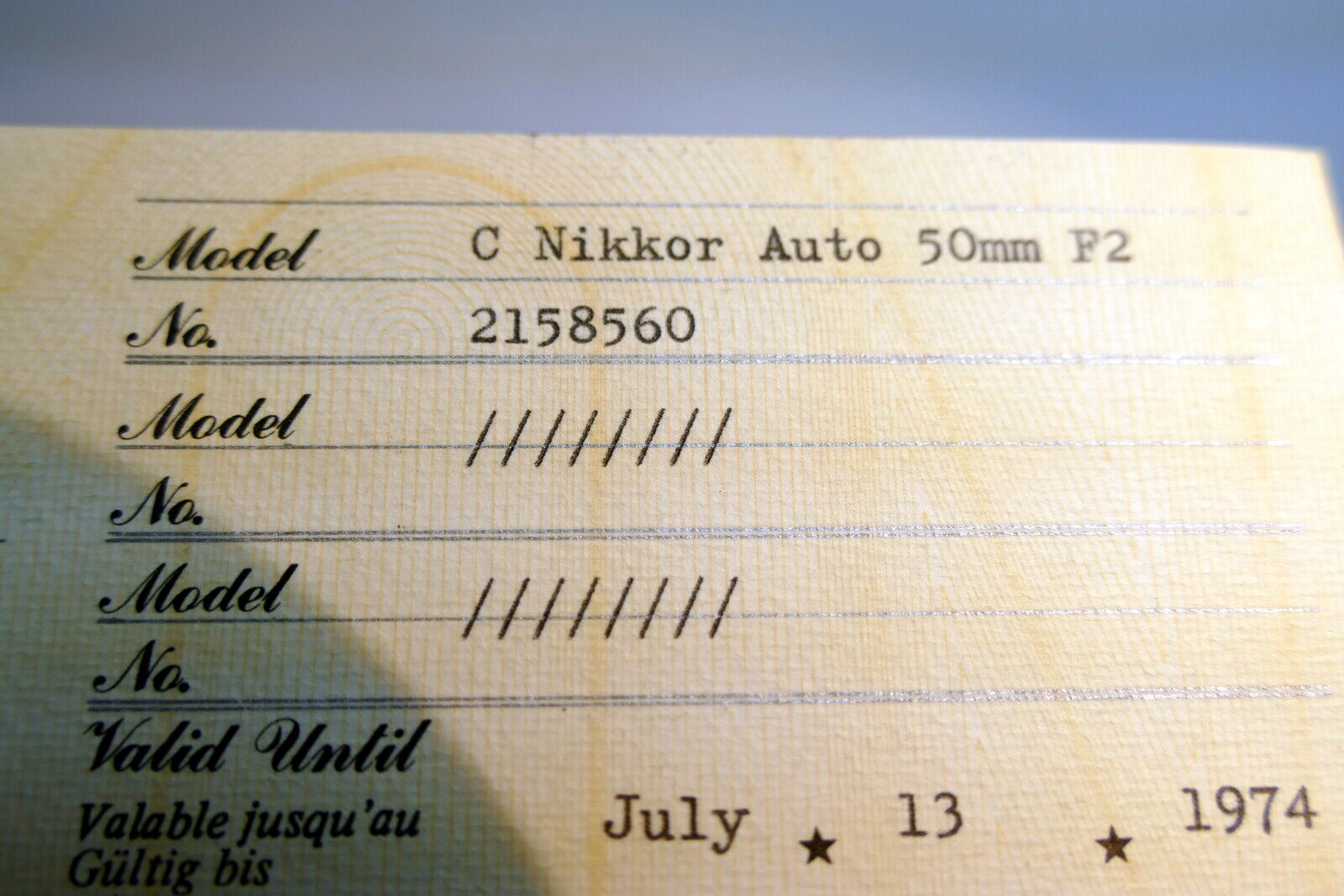 Nikon warranty card 1974 model  C Nikkor auto 50mm f2  vintage