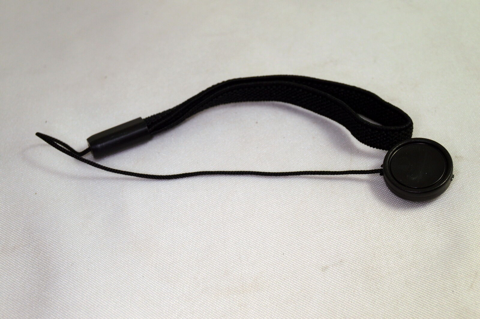 Lens Cap Keeper/ holder stick on type with string