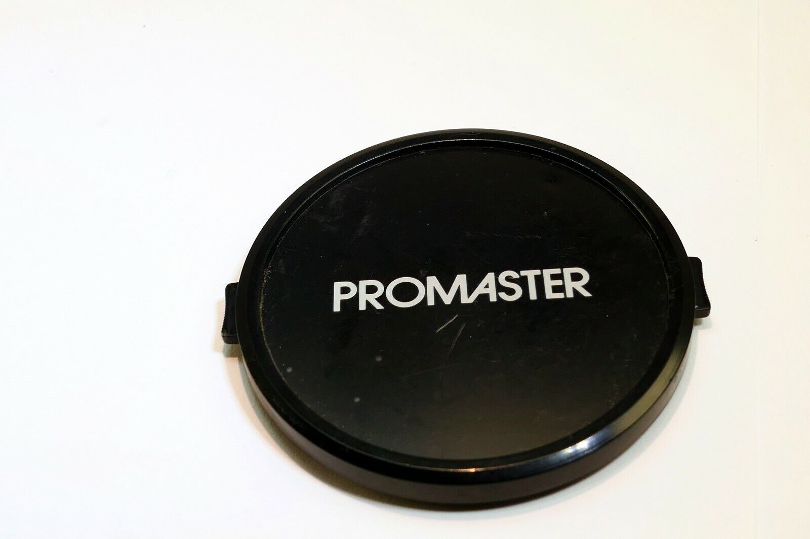 Promaster  62mm Front Lens cap snap on genuine for 18-200mm XR EDO AF