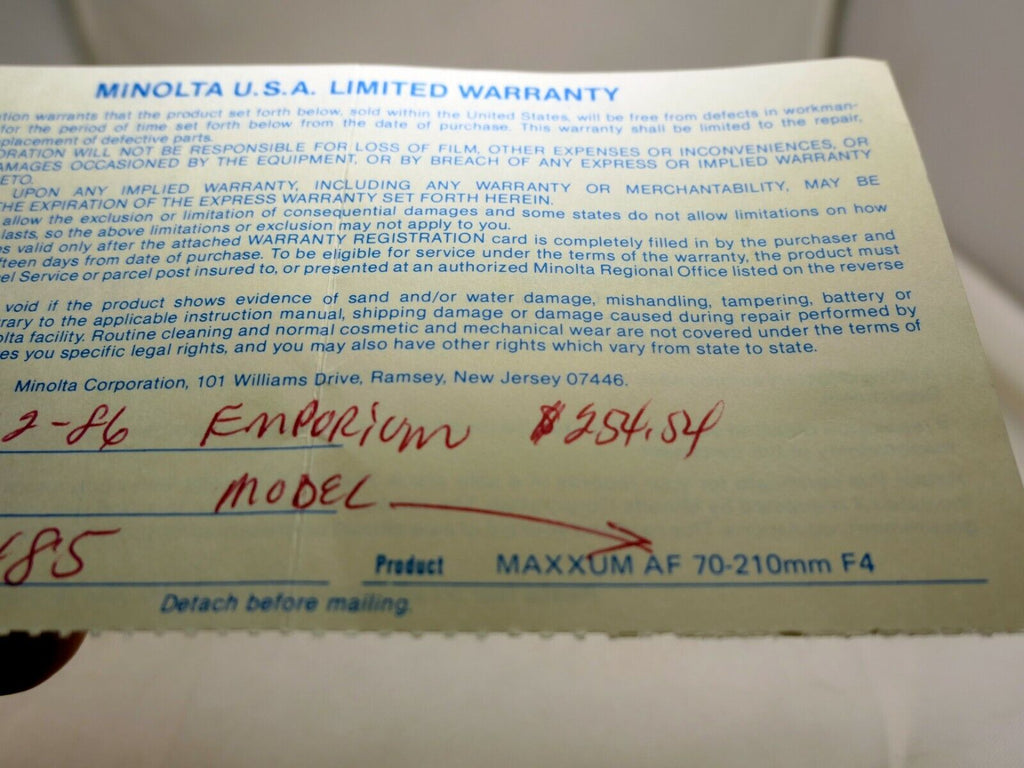 MINOLTA used  warranty card  for Maxxum  AF 70-210mm f4 lens