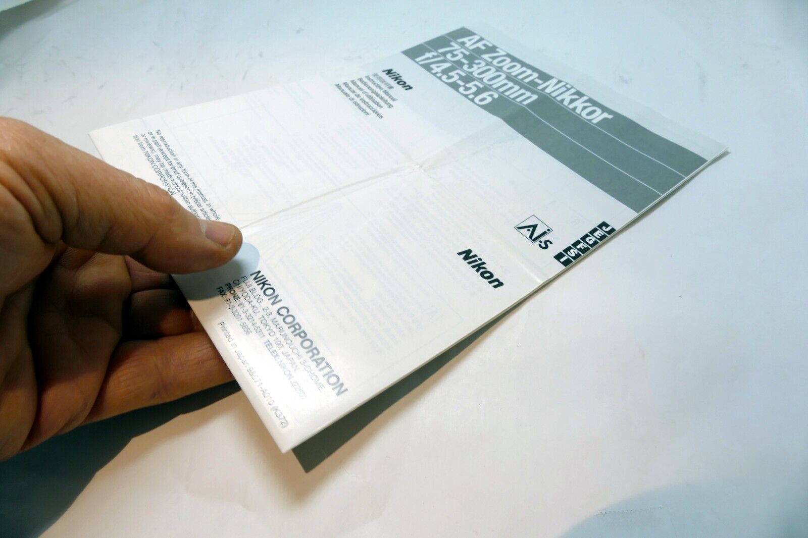 Nikon AF Nikkor 75-300mm f4-5.6 Lens Instruction Guide E English J G S Fr I