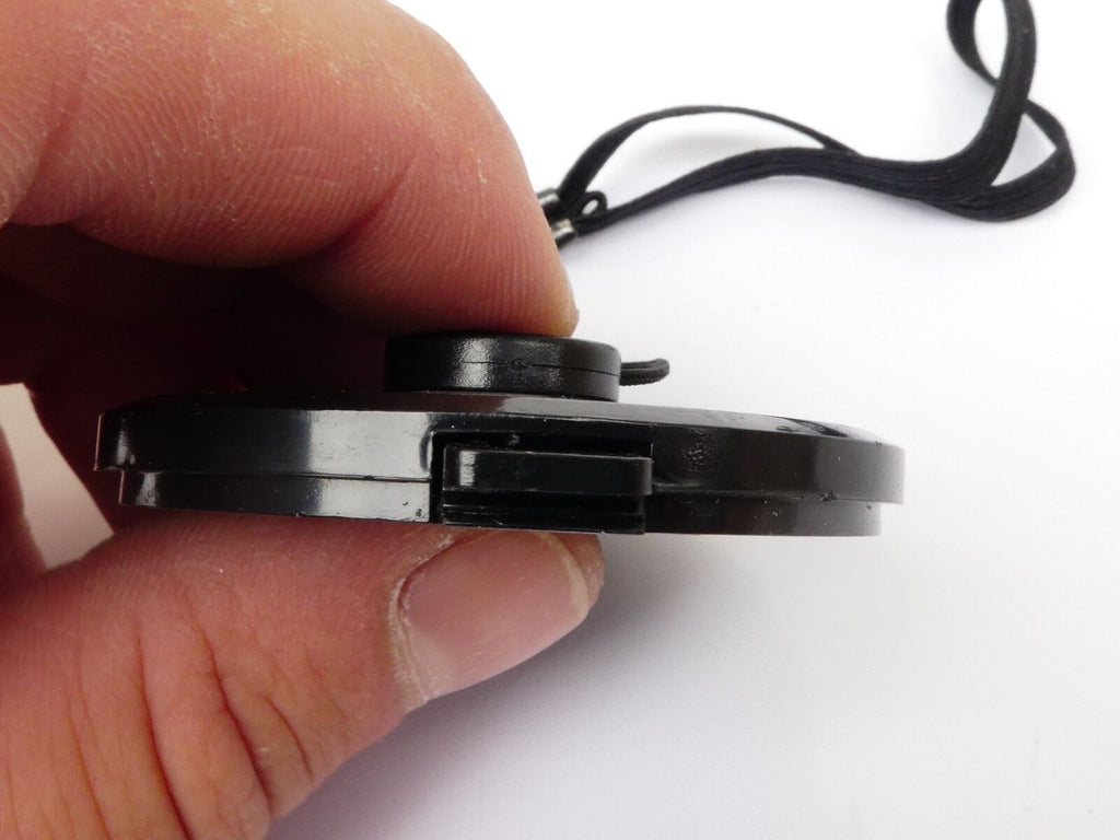 Used 49mm Lens Front Cap Black snap-on type plastic with strap Hong Kong