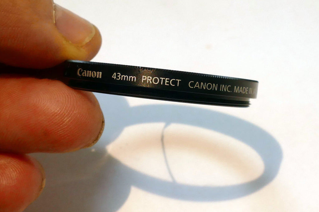 Canon 43mmm Filter clear protection - DAMAGED, Cracked glass ring good