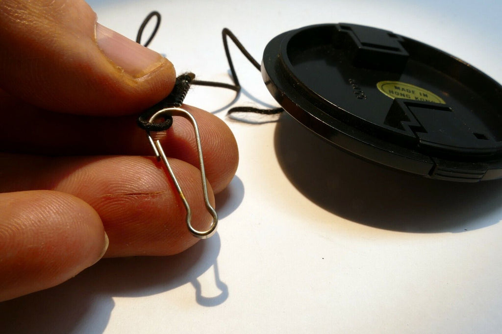 Plastic 55mm Lens front Cap made in Hong Kong with keeper string for f1.7 f1.8