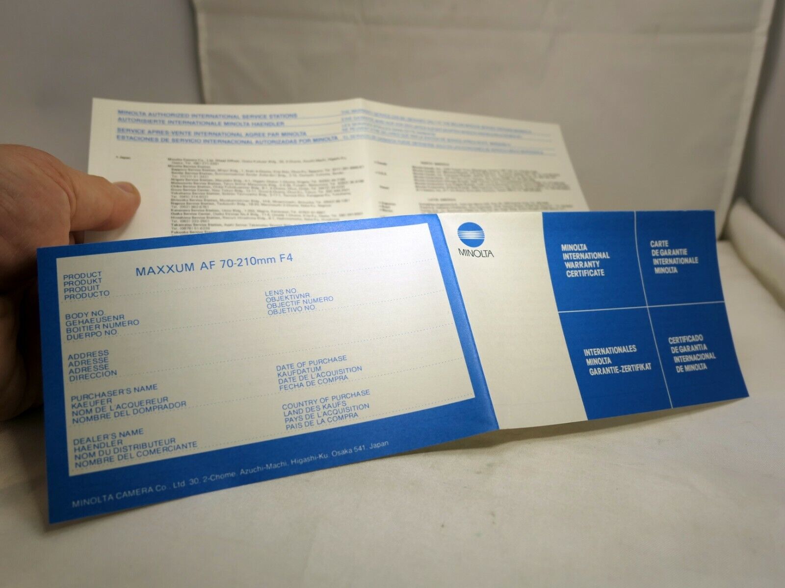 MINOLTA  warranty information  for Maxxum 70-210mm f4 AF  lens