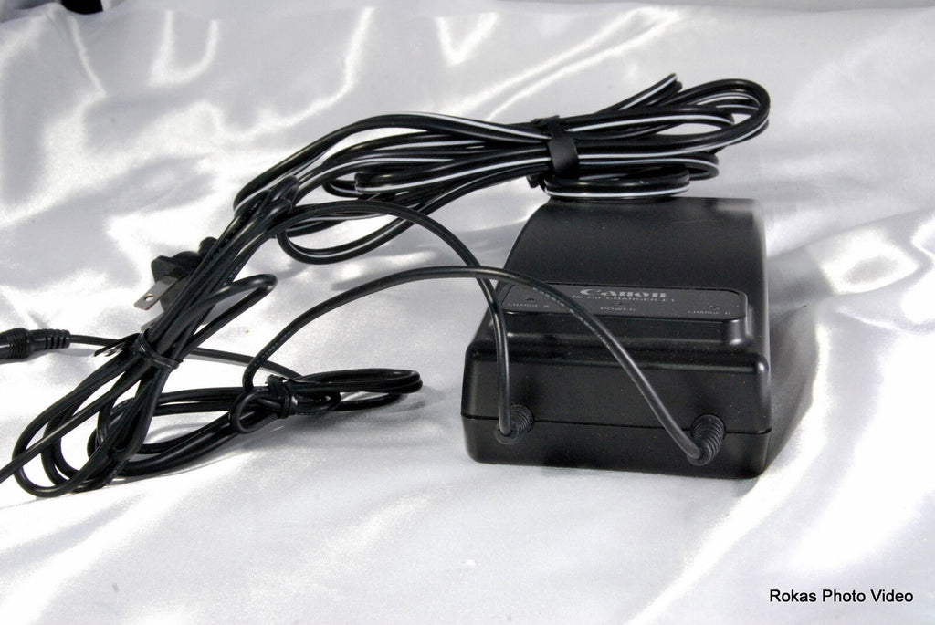 Canon Ni-Cd battery Charger E1   original  Genuine  OEM