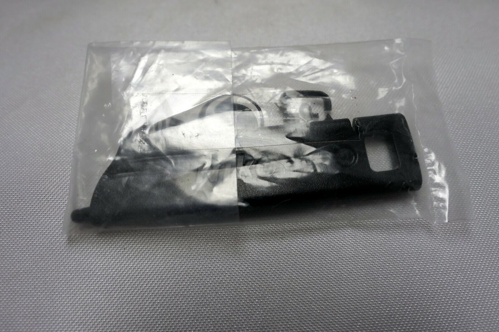 Nikon Coolpix camera plastic key pin