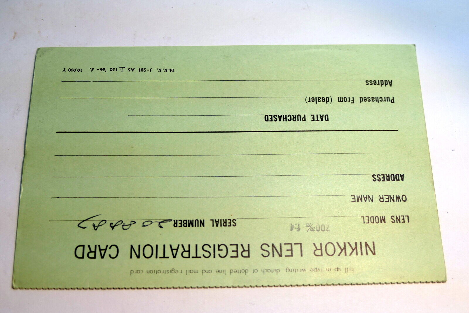 Nikon warranty card 1966 model 200mm f4 lens auto  Nikkor vintage