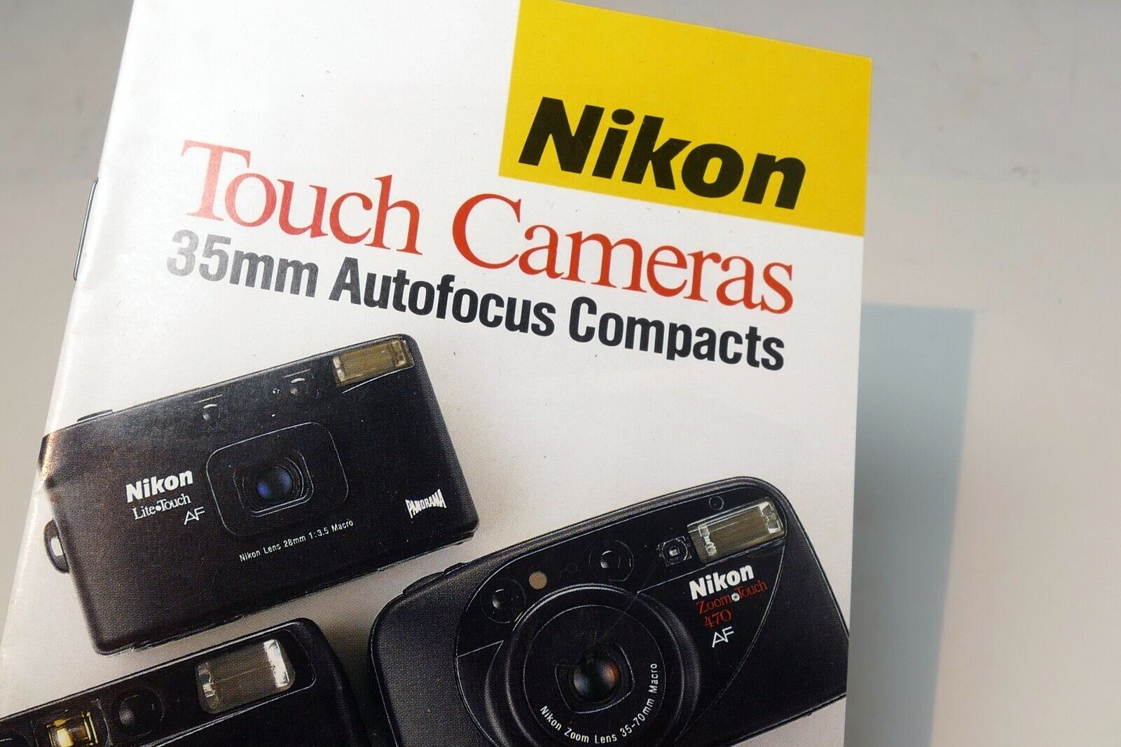 Nikon Touch Cameras 35mm Autofocus Compacts Brochure 1993 advertisement add