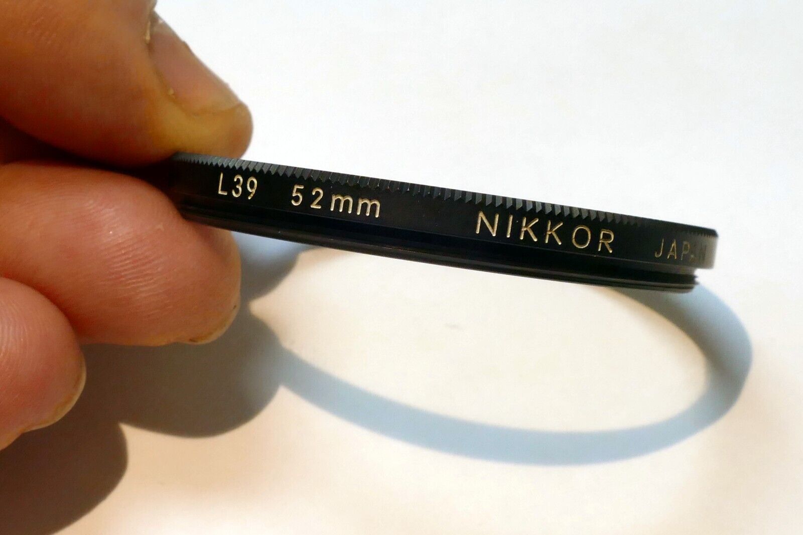 Nikon Nikkor 52mm L39 Filter UV Haze  - genuine , with coating separation