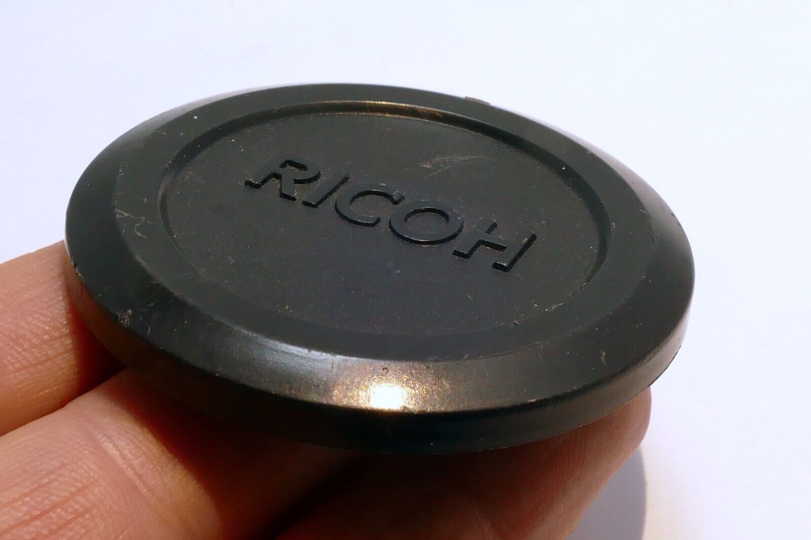 52mm Ricoh Front Cap slip over on plastic