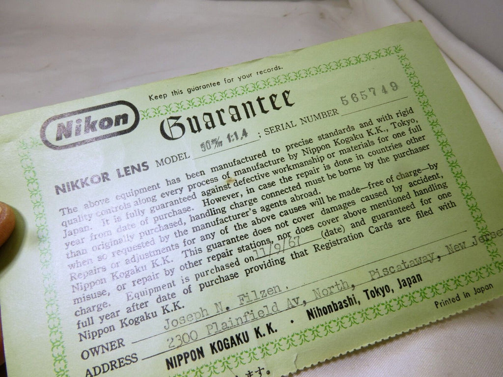 Nikon 50mm f1.4 Nikkor lens guarantee card Ai Non Ai-s  (EN) vintage
