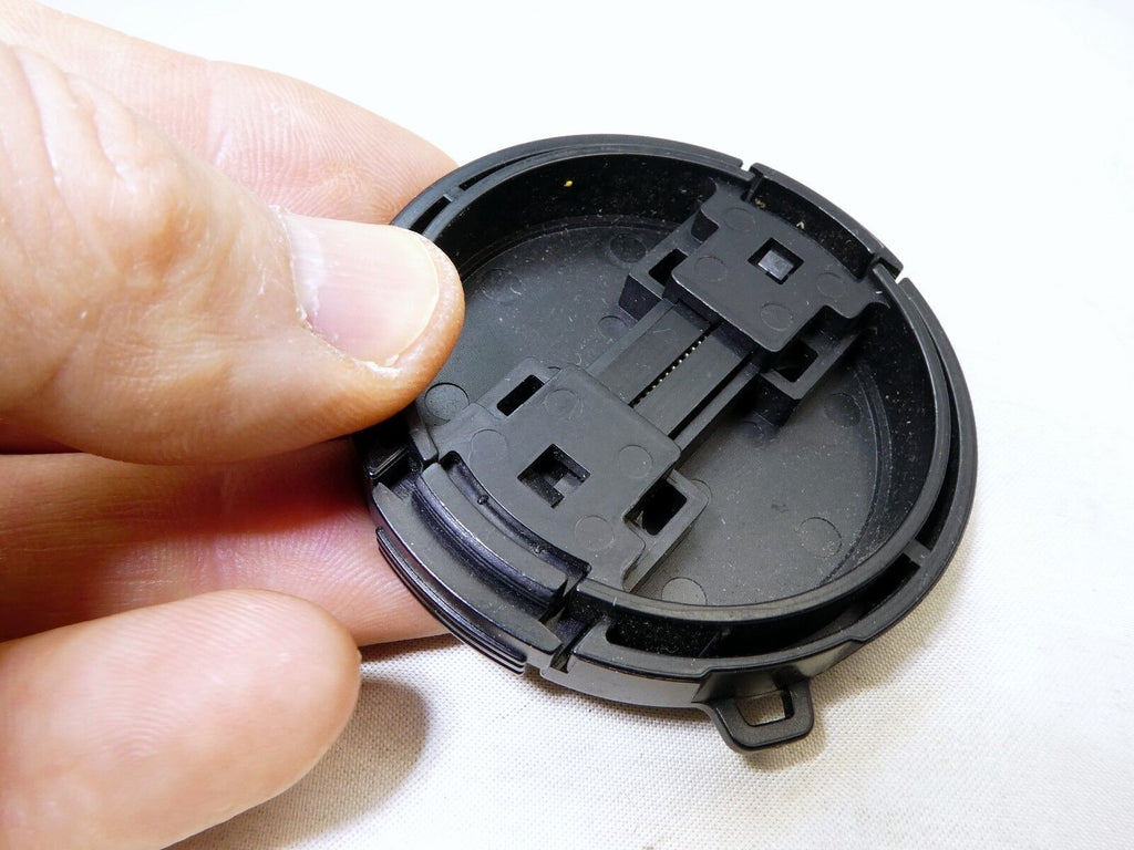 Black 52mm  Lens Front Cap snap on type plastic for SOny Fuji Panasonic cameras