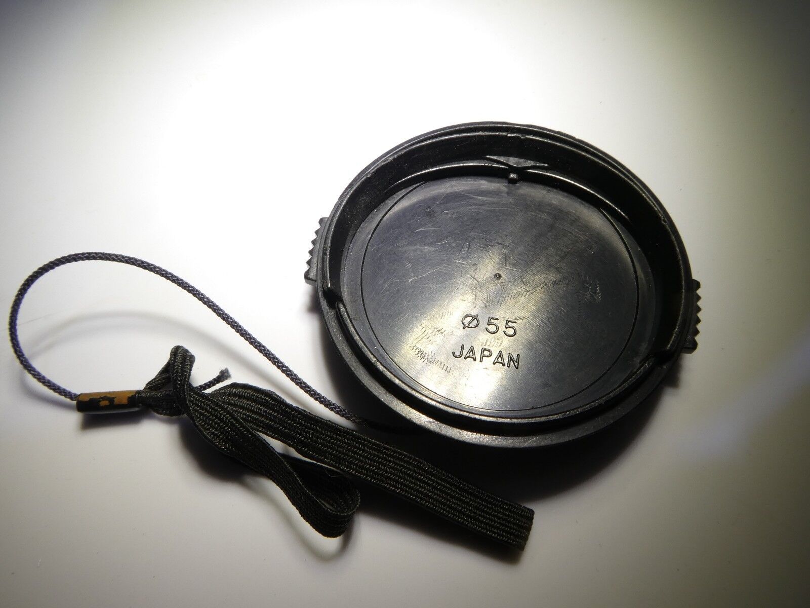 Tokina 55mm RMC II Lens Front Cap with keeper string