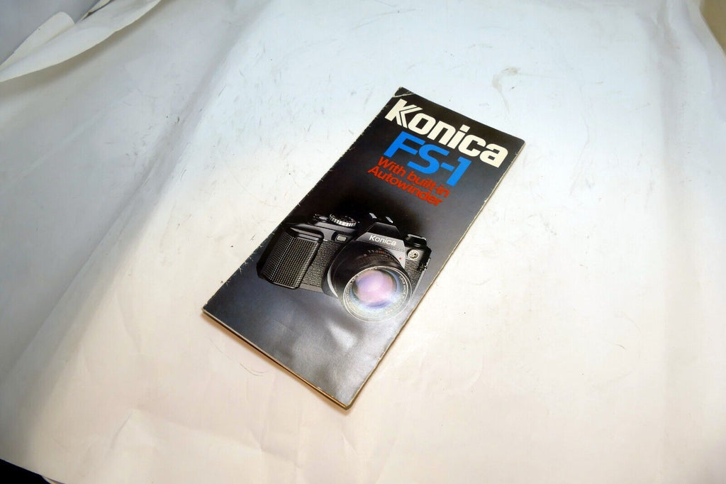 Konica FS-1 camera with built in winder Brochure  Accesory guide