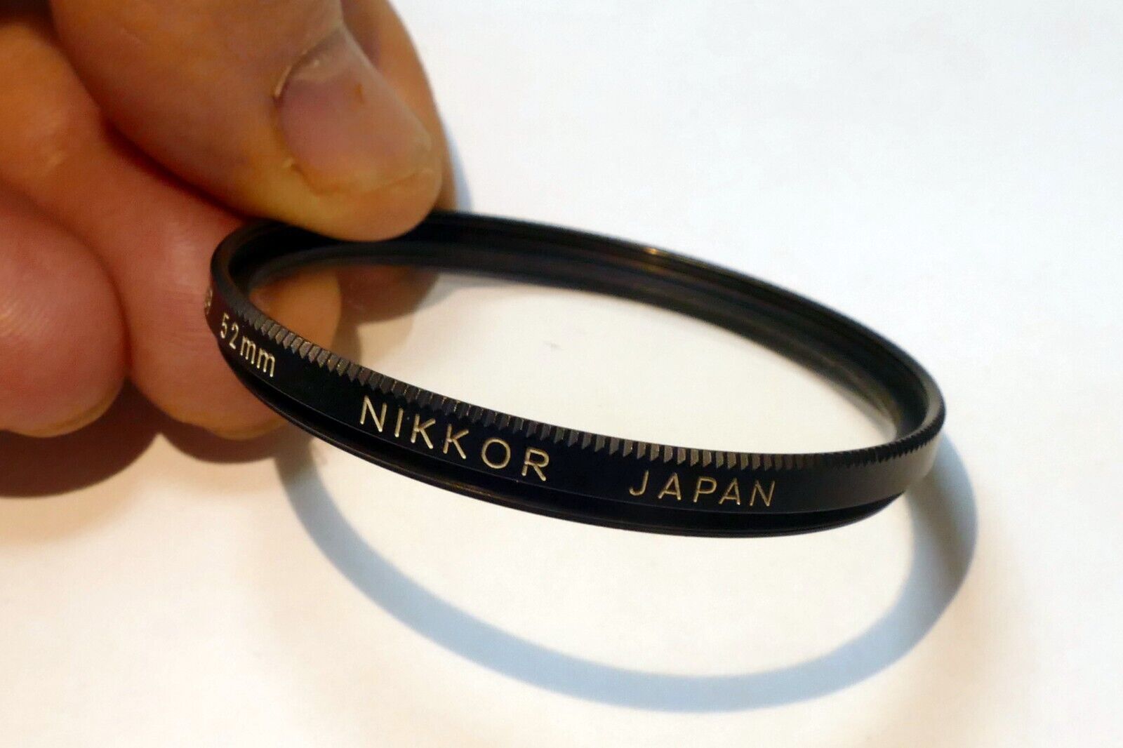Nikon Nikkor 52mm L39 Filter UV Haze  - genuine , with coating separation