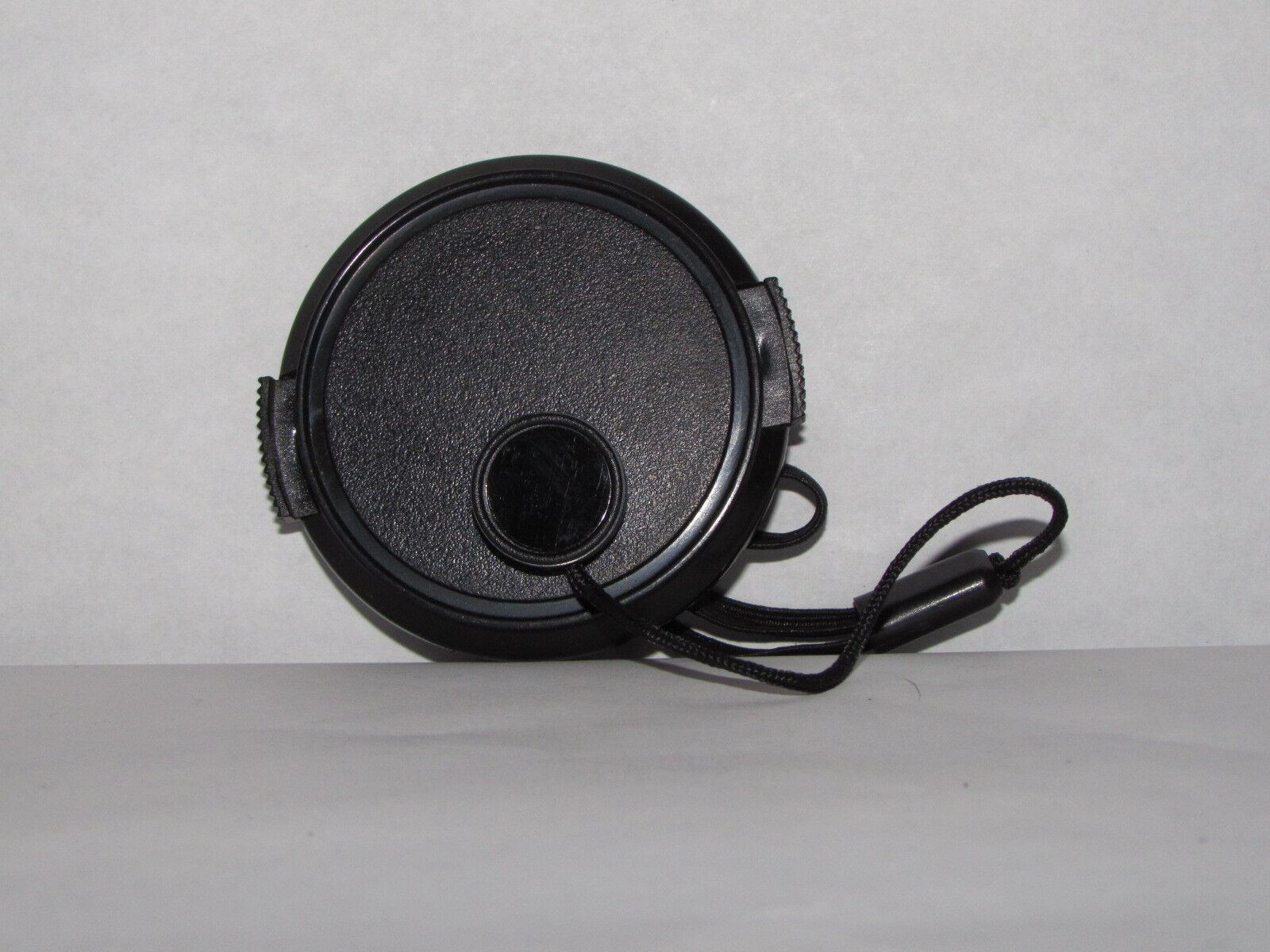 vintage 52mm Front Lens Cap with keeper string snap on black plastic  B20360
